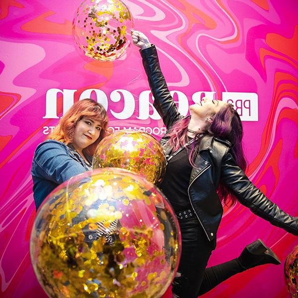 http://yec.healthydairyland.com/wp-content/uploads/2023/06/two-women-holding-balloons-in-front-of-a-pink-pba-beacon-wall.jpg